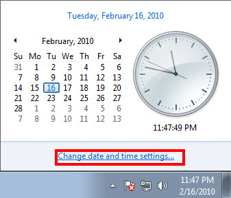 The clock window with the Change date and time link highlighted in Windows 7.